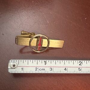 Vintage 1960s Oldsmobile Gold-Tone Tie Clip with Red Accent
